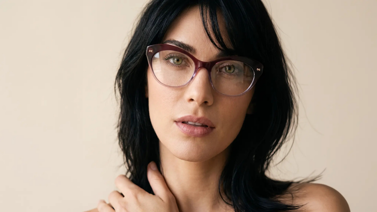 Velvet Eyewear optical style Minnie in Plum. Model image
