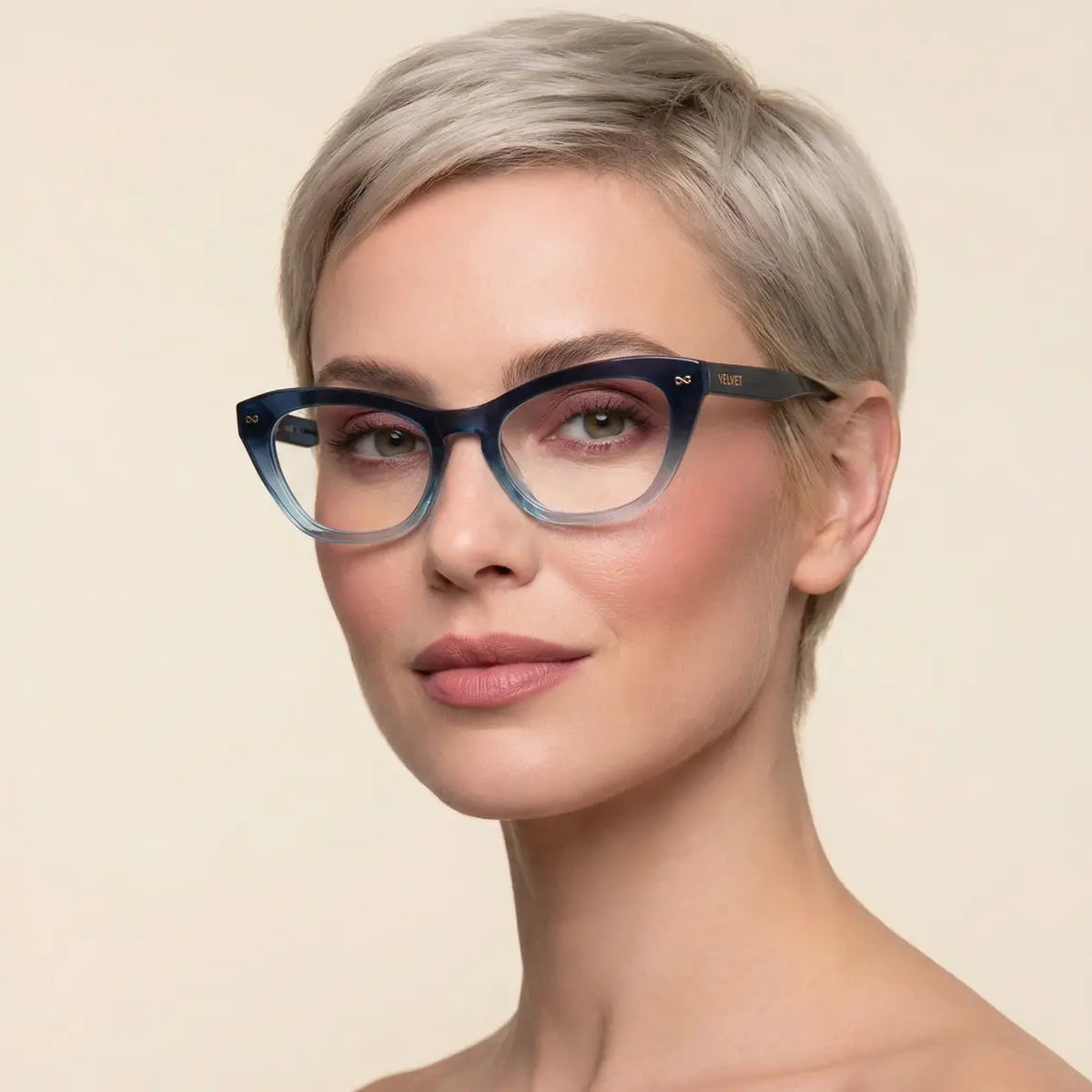 Velvet Eyewear® Stevie Gradient Blue Bio-Based cat-eye optical frames, for oval, heart and round face shapes and Winter, Summer and Spring seasonal color palettes, worn by a model