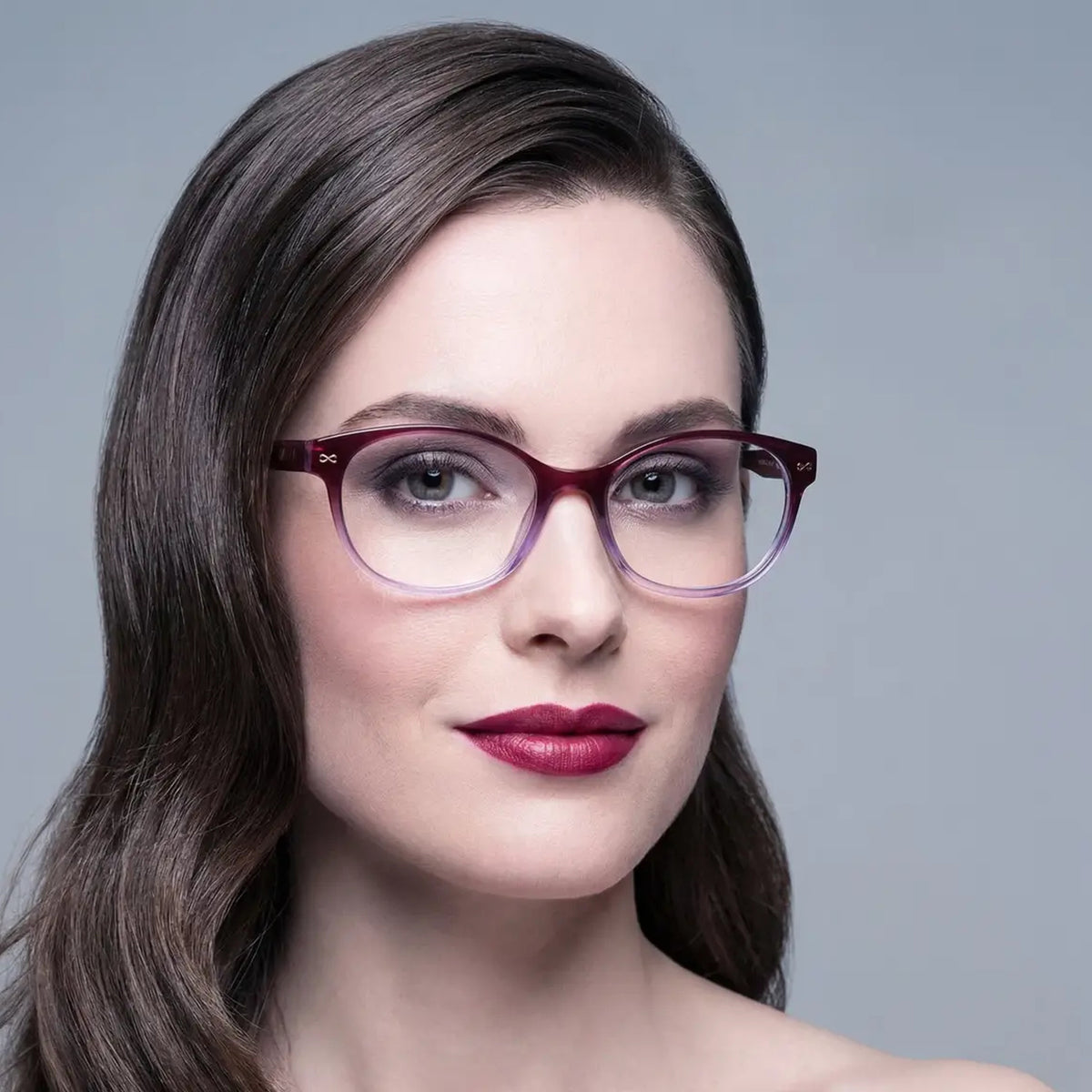 Velvet Eyewear® Joan plum gradient optical frames, square portrait for square face shapes and Winter and Autumn seasonal color palettes, worn by a model