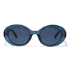 Velvet Eyewear® Iris polarized sunglasses in navy blue, a bold round oval frame in translucent navy with smoke grey polarized lenses and the VELVET wordmark on the temple. Frame shape: Round Oval. Suits oval, square and heart face shapes. Colour palette: Winter, Summer, Autumn, Spring. Navy Blue Polarized. Front view image.
