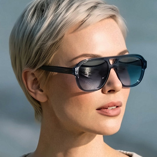 Velvet Eyewear polarized sunglass styel Dani in navy blue model life style image at the beach