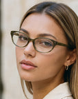Kat for Women by Velvet Eyewear. Best for Oval, Heart, Square, and Round Face Shapes. Winter and Autumn Palette. Worn by our model Mia.