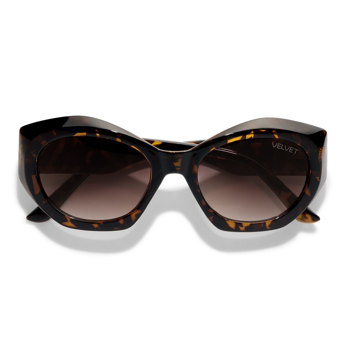 Velvet Eyewear sunglass style Alice in Tortoise; front view of the cat-eye sunglasses with gradient lenses. Best for Oval, Square, and Heart Face Shapes. Best for all seasonal color palettes.