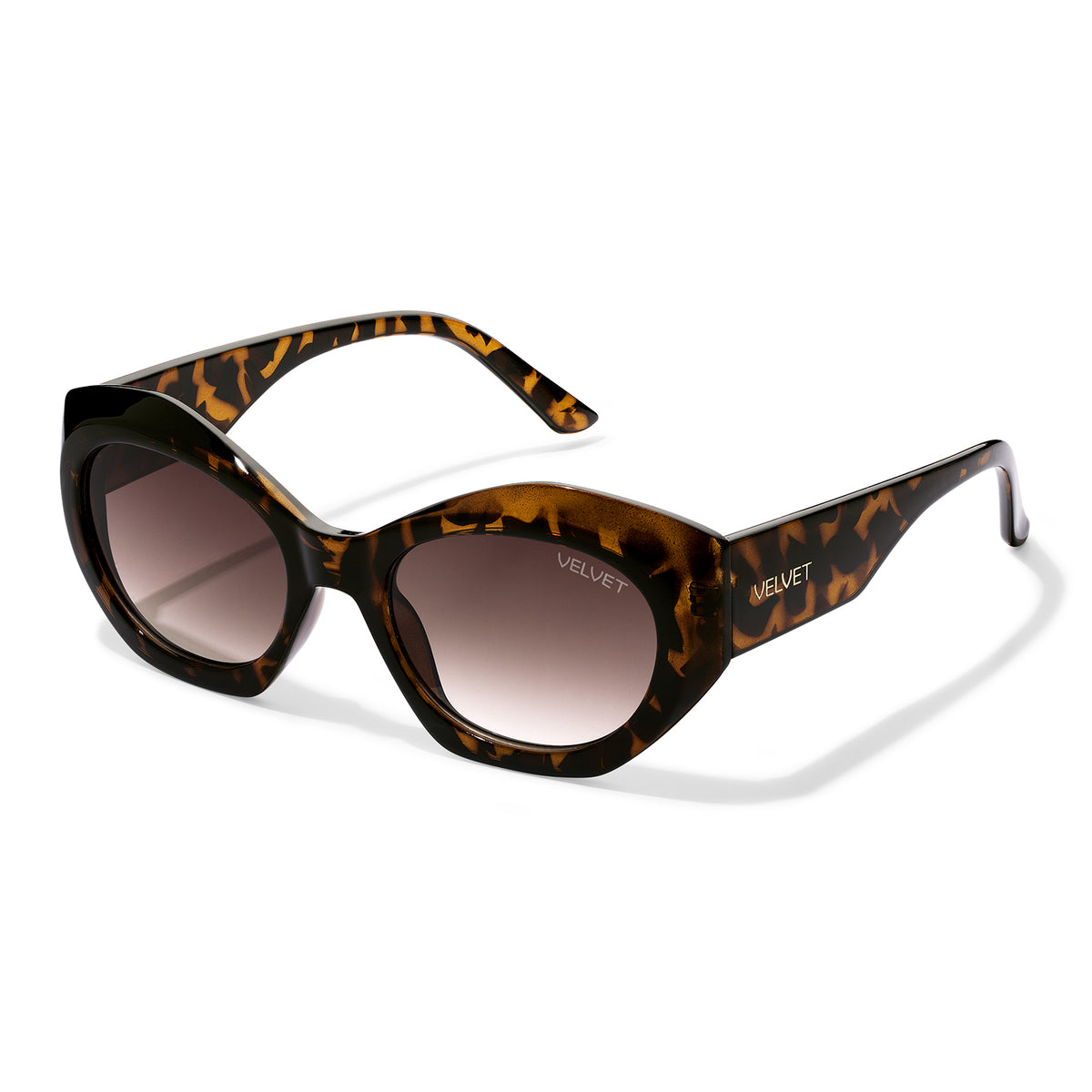 Velvet Eyewear sunglass style Alice in Tortoise; angled side view of the cat-eye sunglasses. Best for Oval, Square, and Heart Face Shapes. Best for all seasonal color palettes.
