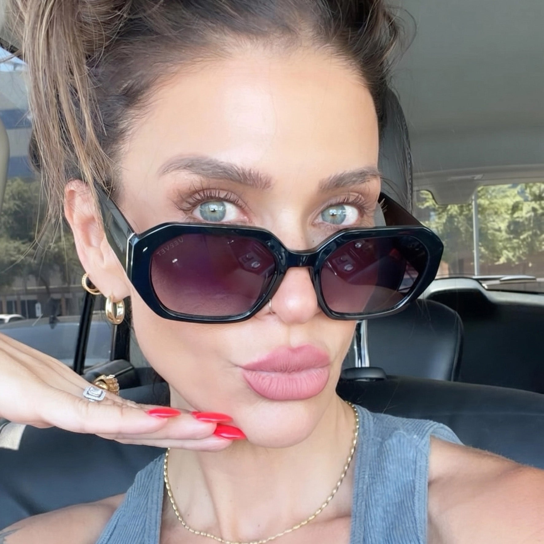 Nina sunglass by Velvet Eyewear. Designed for Oval, Round, and Heart Face Shapes. Lifestyle image