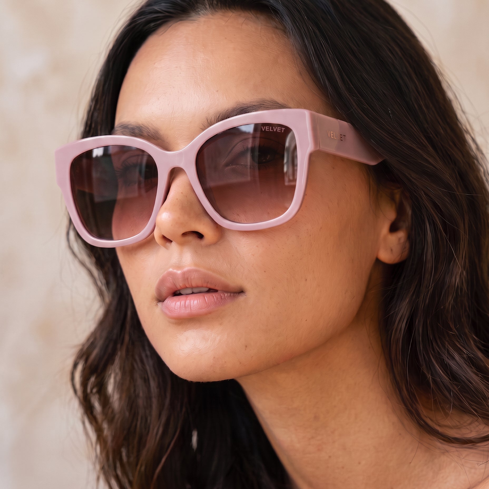 Jane by Velvet Eyewear. Polarized sunglass in lavender. Designed for Oval, Square, and Heart Face Shapes. Great for all seasonal color palettes. Model photo.